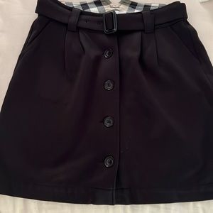 Burberry children’s line black button front/belted skirt